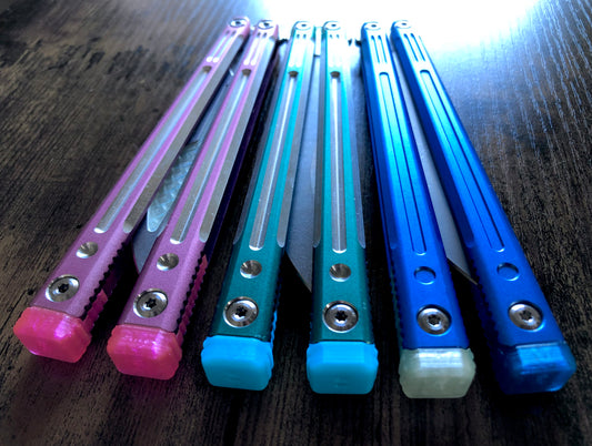These LDY Orion extension spacers and tang inserts are made in-house from a rubbery, shatter-proof polyurethane. The spacers extend the handles, feature jimping, and enable adjustable balance with up to 3x removable tungsten weights per spacer. This product includes cosmetic tang inserts in the same color selected for the spacers.