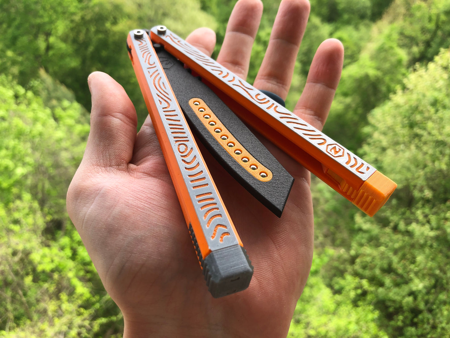 The most durable and premium plastic balisong trainer available: The Zippy Cycloid is the best plastic balisong for beginners and experienced flippers alike, featuring the renowned Zippy bearing system, chanwich design, and adjustable balance.The most durable and premium plastic balisong trainer available: The Zippy Cycloid is the best plastic balisong for beginners and experienced flippers alike, featuring the renowned Zippy bearing system, chanwich design, and adjustable balance.