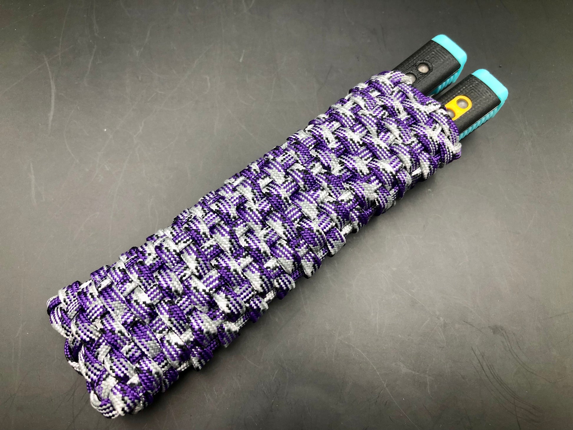 These handmade paracord slips made by @BalisongSlips on Instagram offer a functional way to pocket-carry your favorite EDC balisong while protecting your fingers, your balisong, and everything else in your pocket.