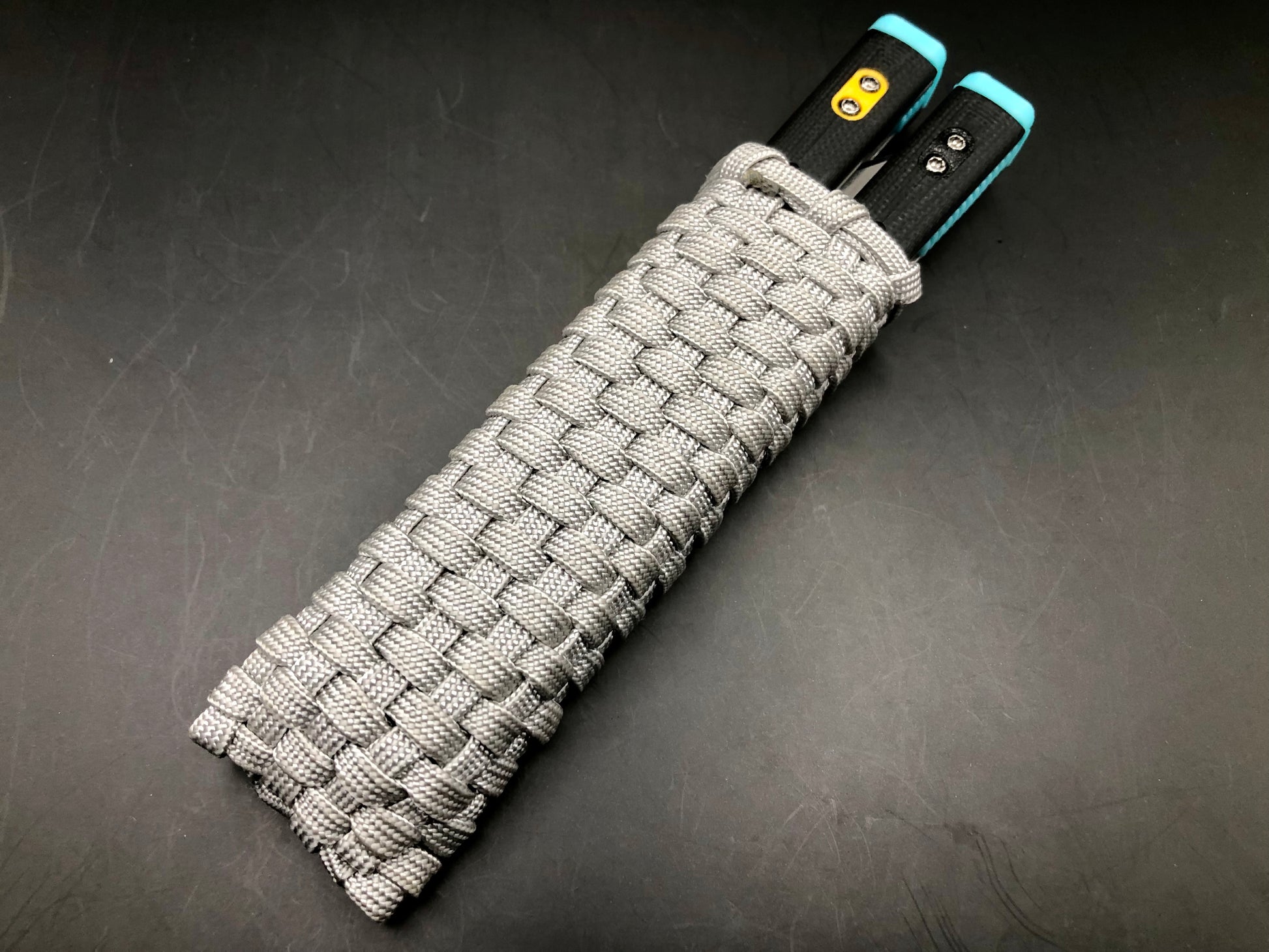 These handmade paracord slips made by @BalisongSlips on Instagram offer a functional way to pocket-carry your favorite EDC balisong while protecting your fingers, your balisong, and everything else in your pocket.