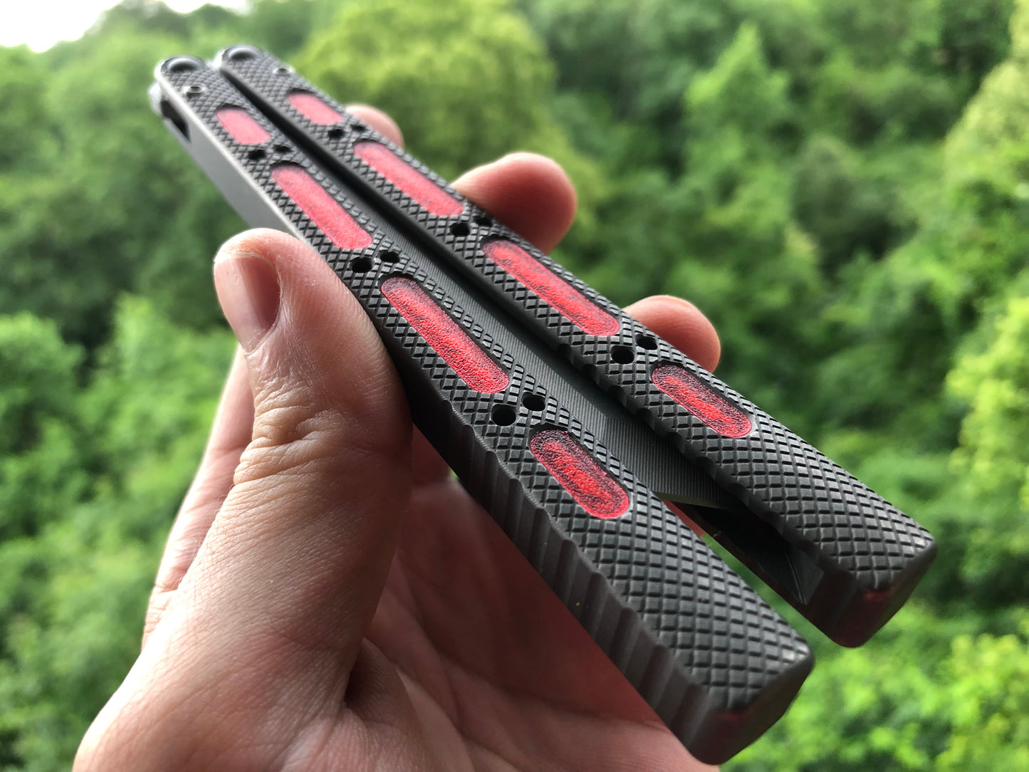 Modify the grip of your NRB Concepts SLight balisong and NRB UltraLight balisong trainer with Zippy handle inlays.
