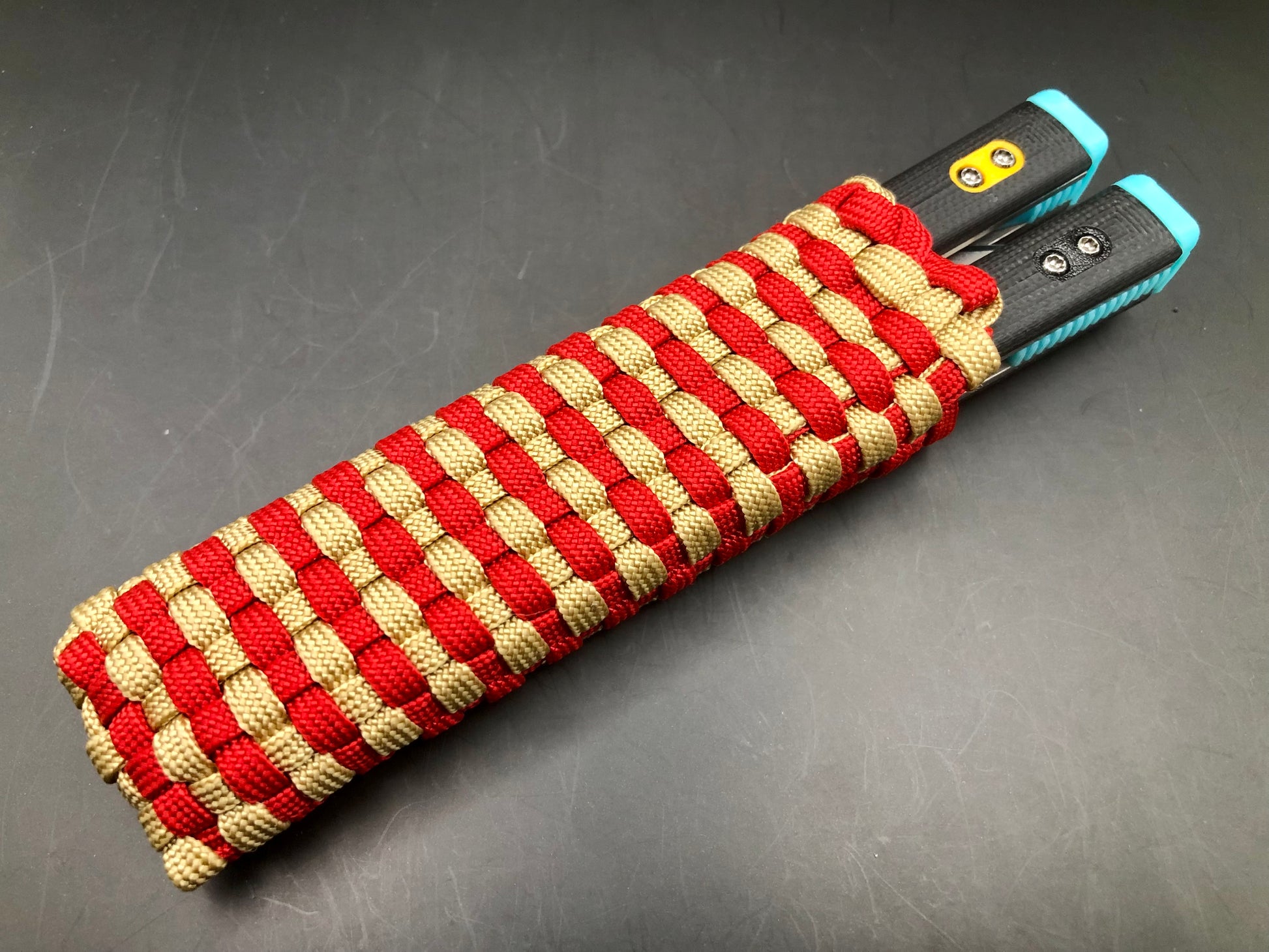 These handmade paracord slips made by @BalisongSlips on Instagram offer a functional way to pocket-carry your favorite EDC balisong while protecting your fingers, your balisong, and everything else in your pocket.