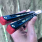 These Black Balisong Rebola v2 spacers are made in-house from a rubbery, shatter-proof polyurethane. They are ultra-lightweight extension spacers that reduce the stock handle-bias. They also feature positive sawtooth jimping and enable adjustable balance with up to 1x removable tungsten weight per spacer.