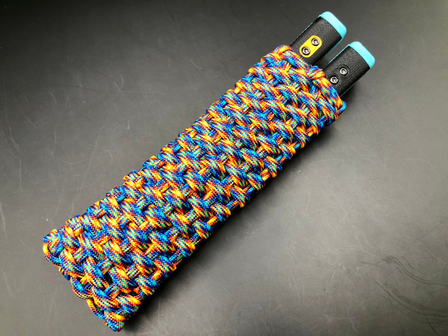 These handmade paracord slips made by @BalisongSlips on Instagram offer a functional way to pocket-carry your favorite EDC balisong while protecting your fingers, your balisong, and everything else in your pocket.