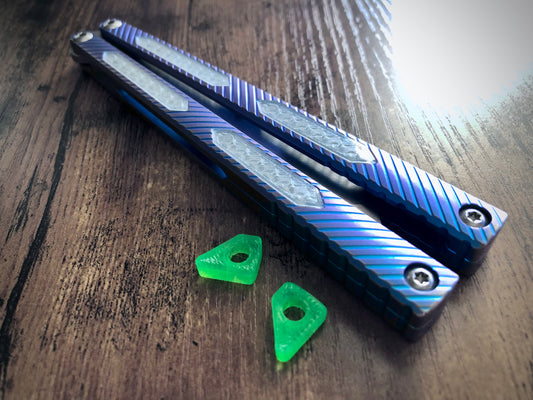 Zippy mods for the MachineWise Opus, Serif, Prysma, and SlifT v2 balisongs to change the balance, add grip, and eliminate the ring.