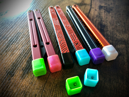 Protect your favorite balisong handles from concrete drops with the original Zippy handle caps. Weight caps to adjust the balance, slim caps for low-profile handle protection and grip for ladders, and LED caps for a light-up balisong experience. Mark your bite handle with the best bite markers on the market.