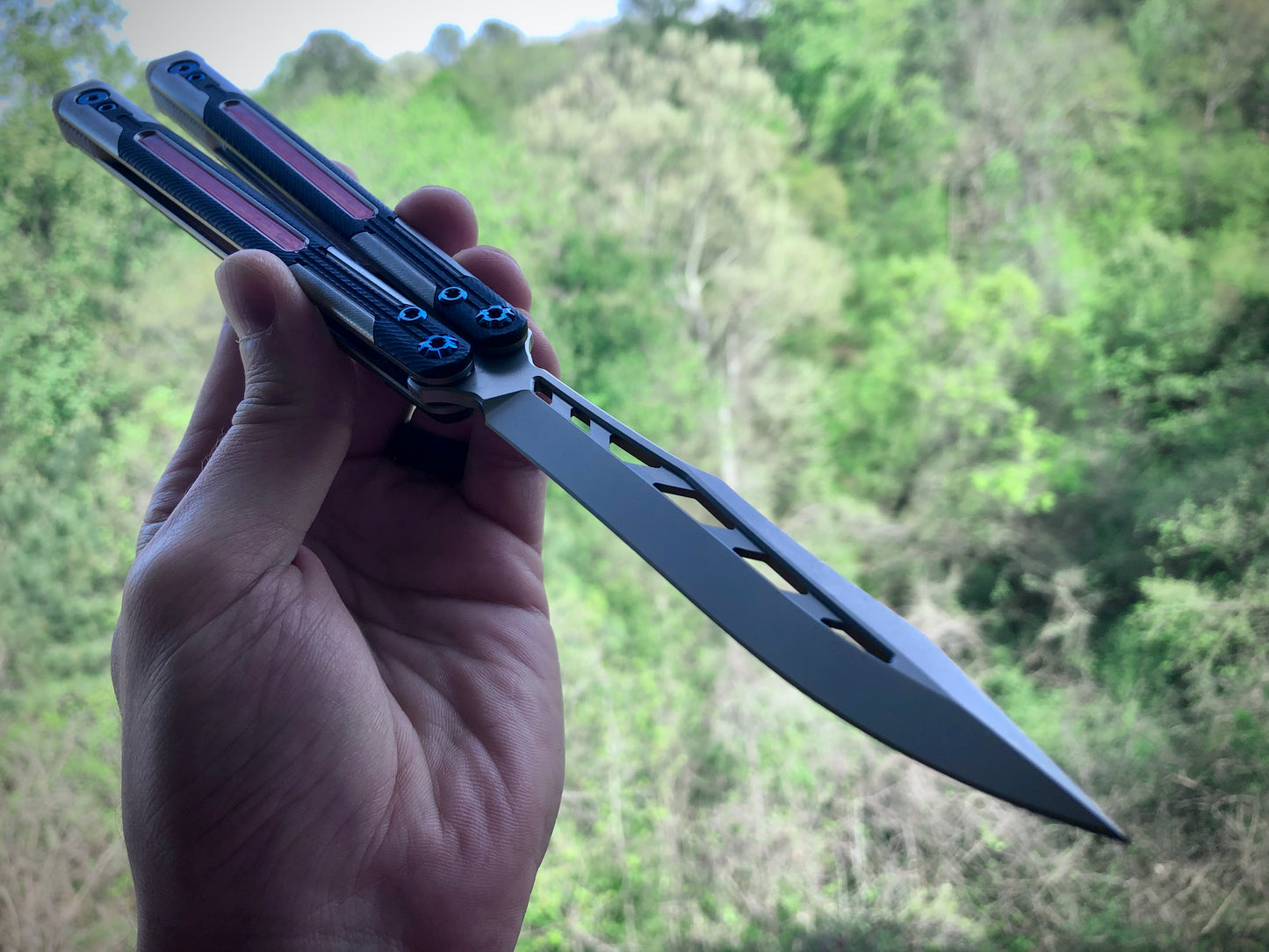 Adjust the balance, extend the handles, and add grip to your LDY balisong Cygnus and Orion flippers with Zippy extension spacers and handle inlays.