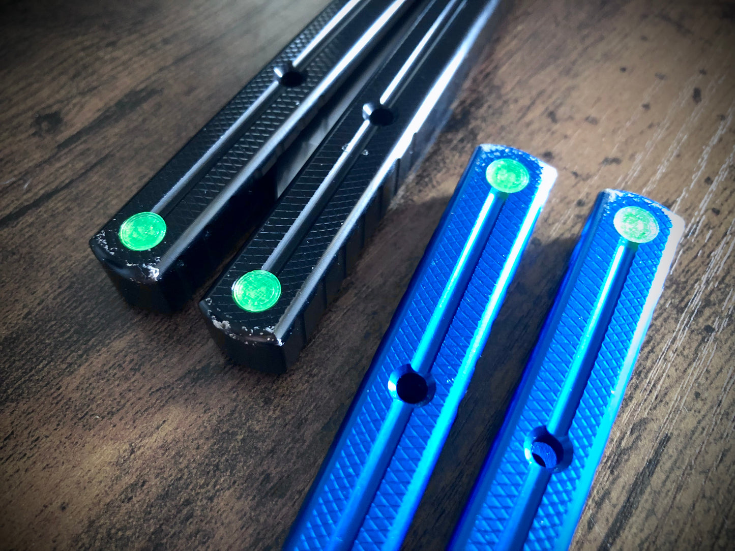 Pivot Plugs are a cosmetic handle inlay mod designed to friction fit in 3/16" bores at the bottom of a variety of balisong handles, including the Squid Industries Krake Raken balisong, the MachineWise Prysma, and the Nabalis Vulp Pro.