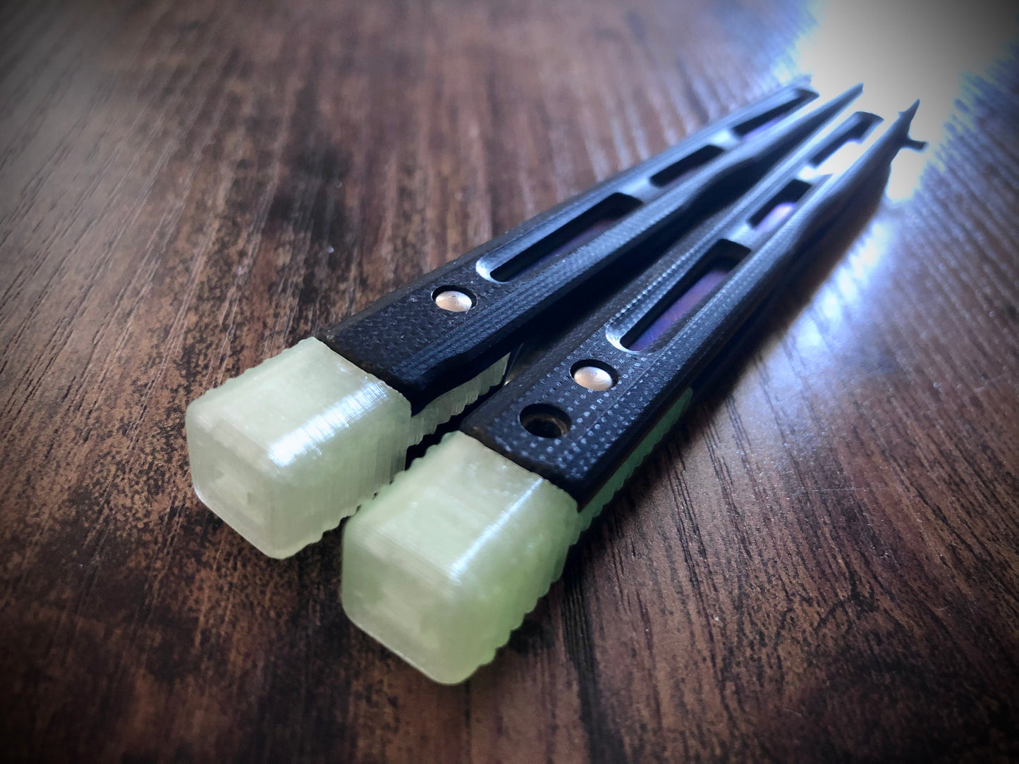 Cousin to Jimpy's discontinued Space Invaders, these Zippy Benchmade 51 spacers are made from a shatter-proof polyurethane with jimping. They extend and protect the handles of the BM 51, and enable adjustable balance with removable tungsten weights.