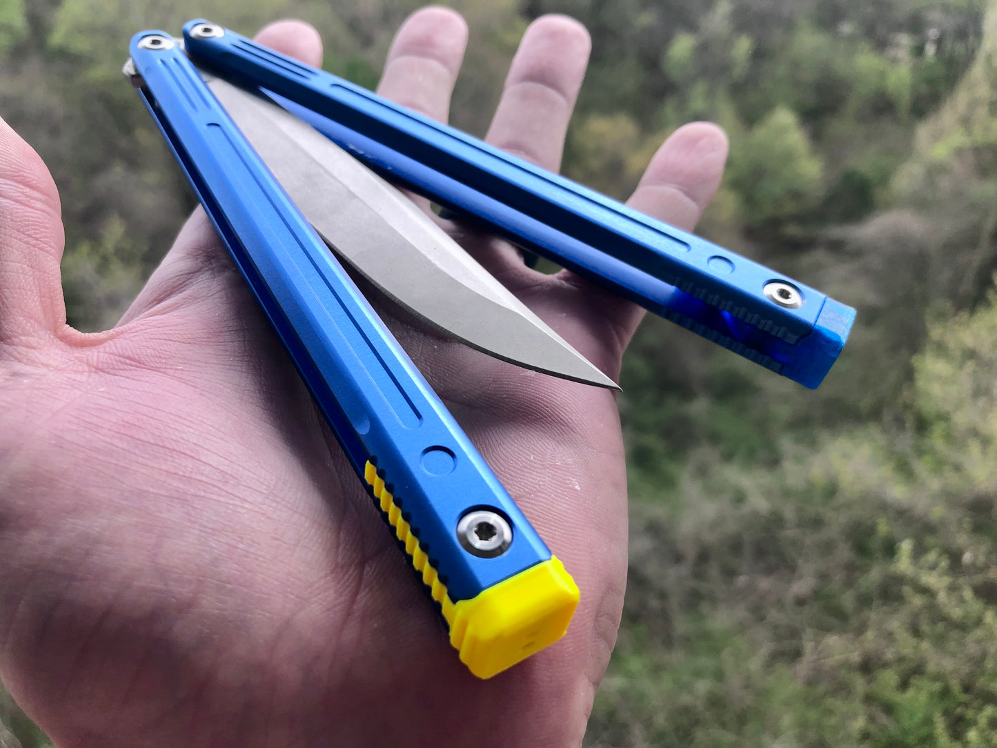 Adjust the balance, extend the handles, and add grip to your LDY balisong Cygnus and Orion flippers with Zippy extension spacers and handle inlays.