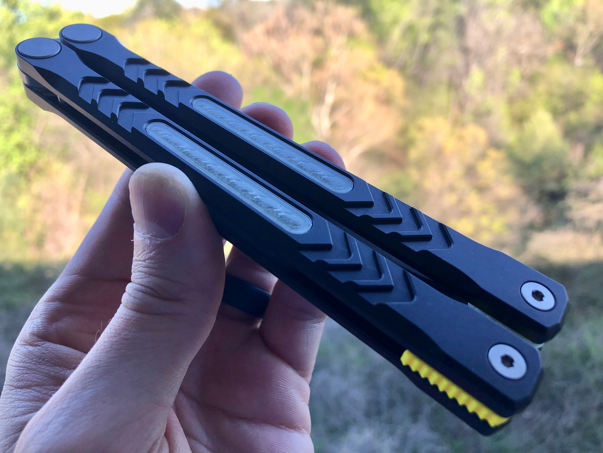 Reduce the handle bias and add grip to your Revo Nexus balisong with Zippy handle inlays and lightweight spacers featuring positive jimping.